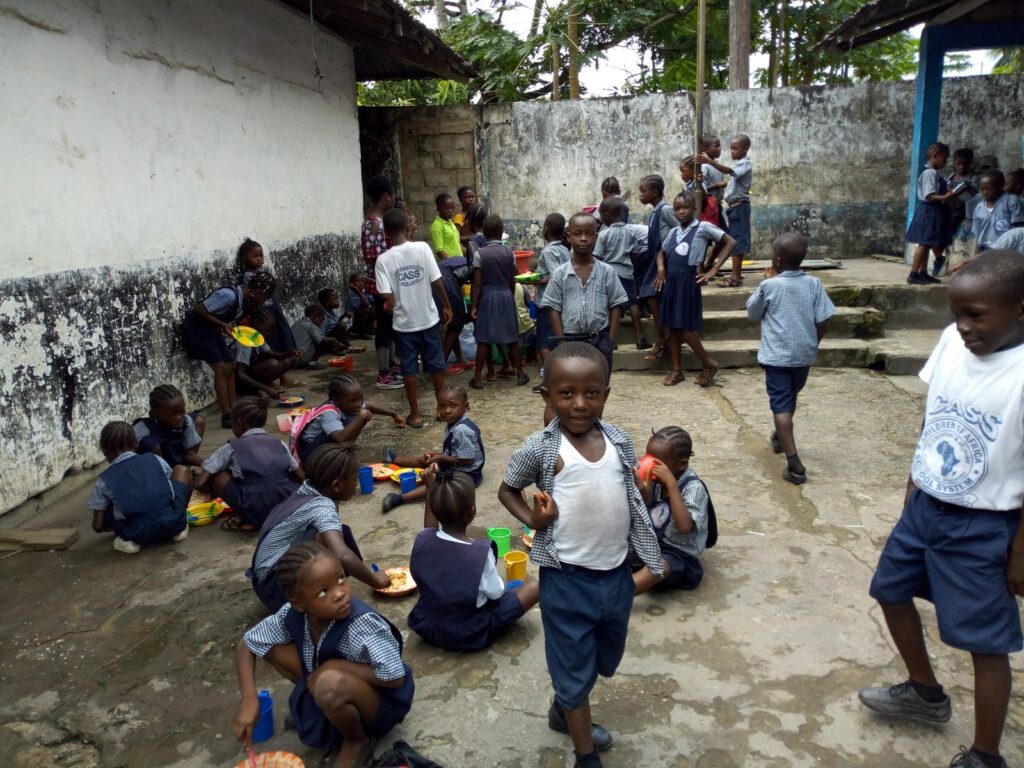 CASS school archive photograph — Feeding Meal
